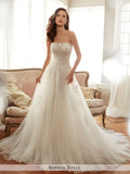 Sophia Tolli strapless tulle soft A-line with semi-sheer neckline wedding gown