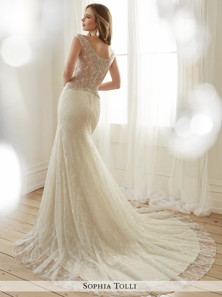 Sophia Tolli allover lace and sequin mermaid with hand-beaded illusion and  V-neckline  wedding gown