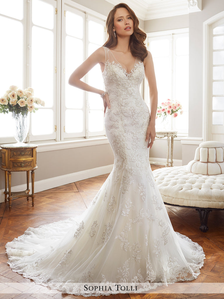 Sophia Tolli misty tulle over soft satin mermaid with illusion shoulder straps and deep V-neckline sleeveless  wedding gown