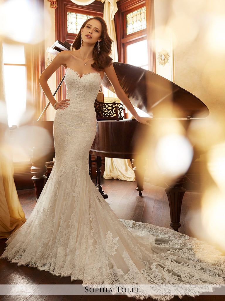 Sophia Tolli strapless misty tulle and Chantilly lace appliqué over sequin mermaid wedding gown